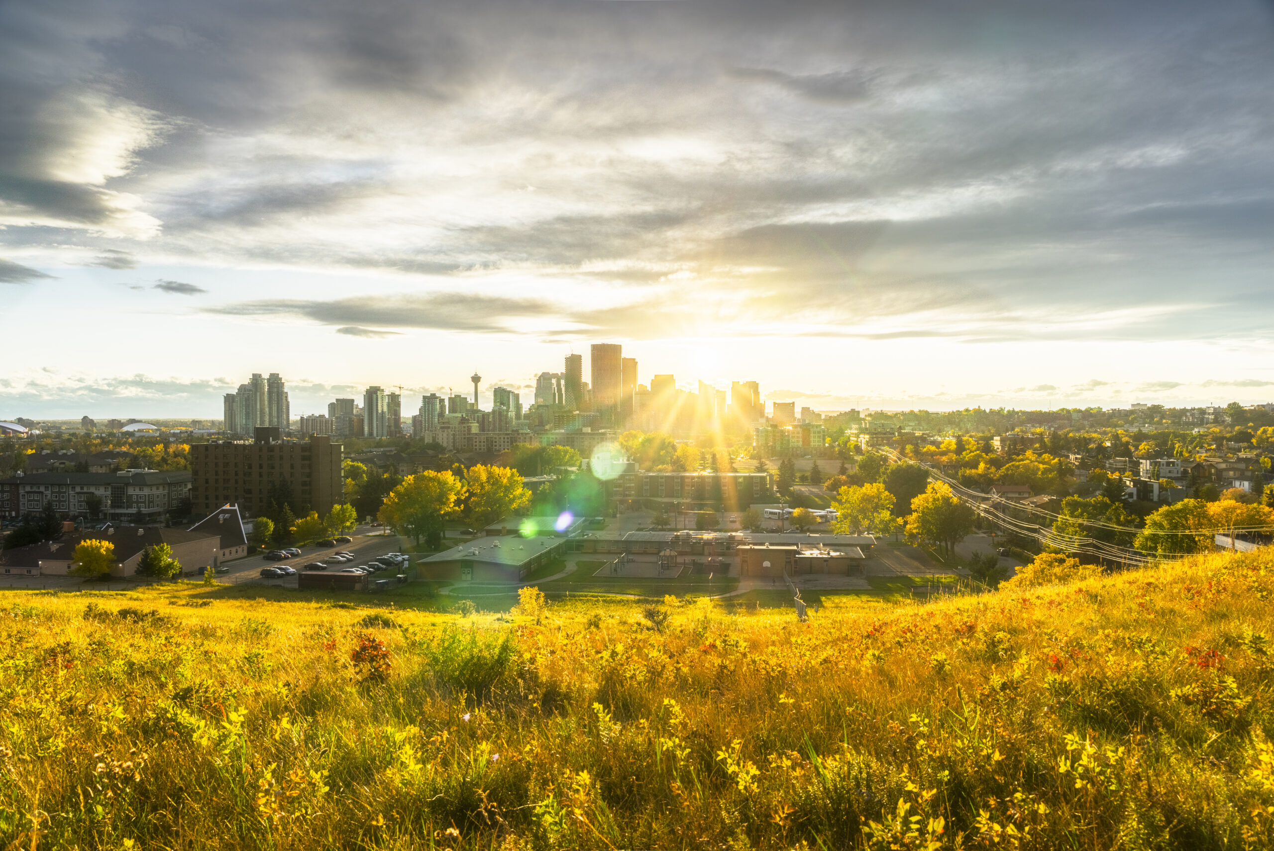 Canada, Calgary, Panoramic view of city at sunset in the fall